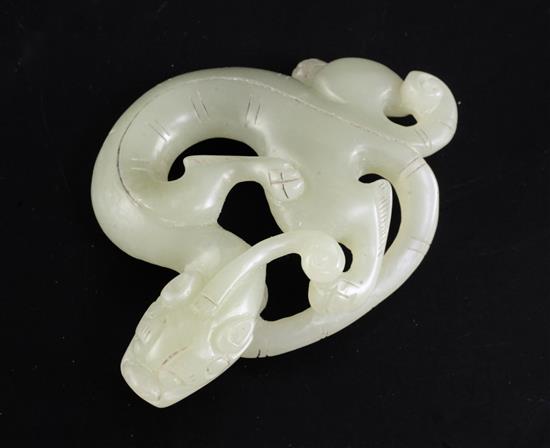 A Chinese celadon jade figure of a chi-dragon, 18th / 19th century, length 6.8cm